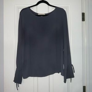 Split sleeve mixed media blouse